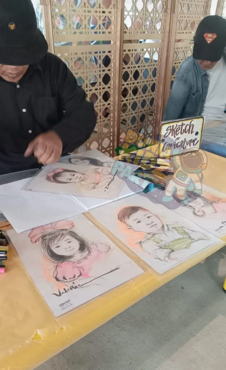 Face Sketching at a kids birthday party by Dunia Kidz Party