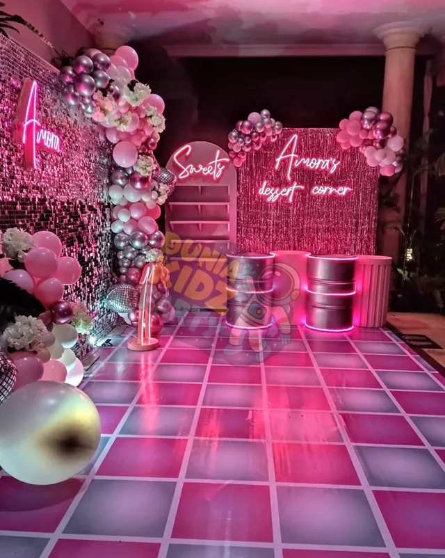 Dessert corner dengan lampu neon dan backdrop sequin pink